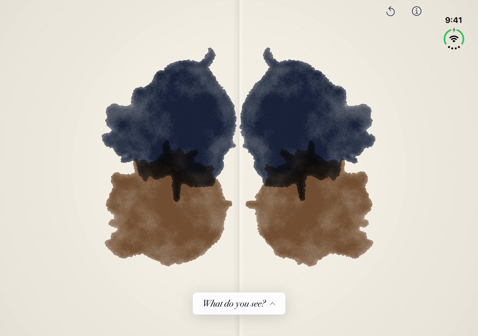 A symmetrical blot spread across both pages, blue-black above and sepia below